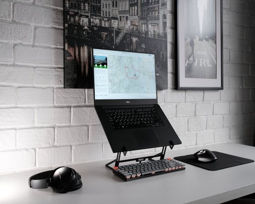 Ergonomic laptop setup with an external keyboard on a clean desk